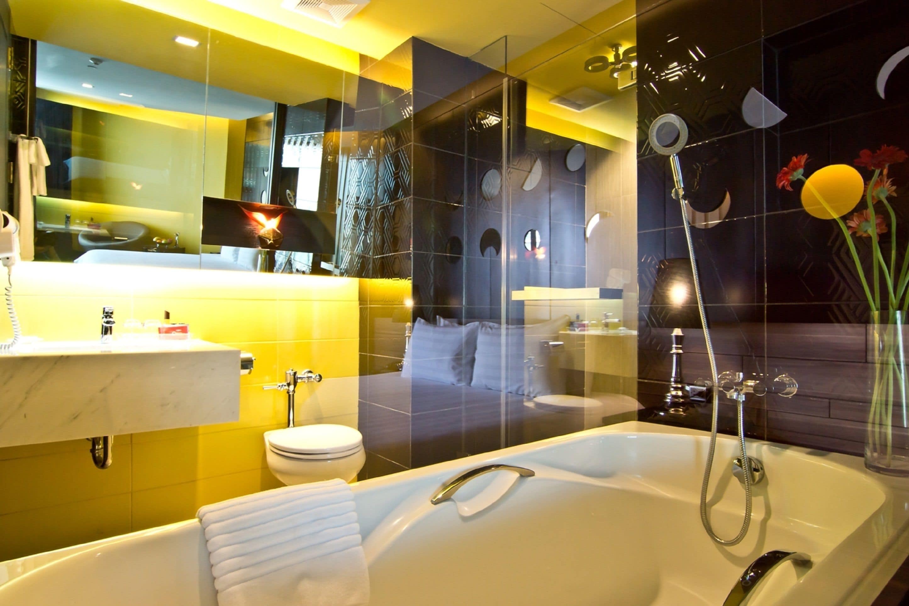 deluxe room | bathroom | separate bathtub and shower, deep-soaking bathtub, rainfall showerhead