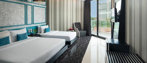 Deluxe Room | 1 bedroom, in-room safe, desk, blackout curtains