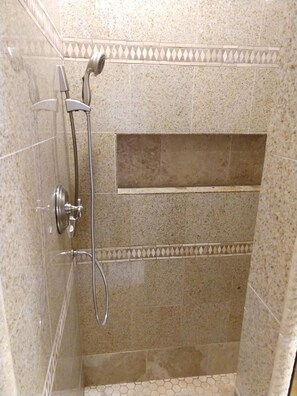 Bathtub, hair dryer, towels, soap
