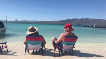 On the beach, beach towels