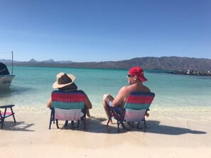On the beach, beach towels