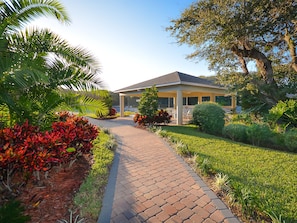 Stroll through the beautifully landscaped garden to a serene covered pavilion.