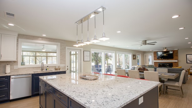 A modern kitchen with a large island, built-in appliances, and ample natural light. - Loblolly's Pinehurst No. 3 Retreat on the 11th Fairway! (Pinehurst)