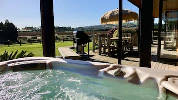 Exclusive House, 3 Bedrooms, Hot Tub, Garden View | 2 bedrooms, individually decorated, individually furnished, desk