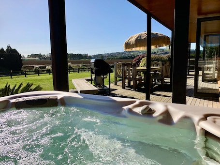 Exclusive House, 3 Bedrooms, Hot Tub, Garden View | 2 bedrooms, individually decorated, individually furnished, desk