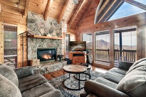 TV connectée, cheminée, lecteur de DVD, baby-foot