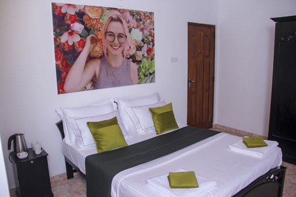 Kahden hengen standard-huone, 1 parisänky, tupakointi kielletty, näköala puutarhaan | 1 makuuhuone, ylelliset vuodevaatteet, työpöytä, silitysrauta/-lauta