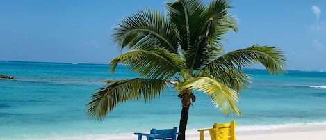 Sun loungers, beach umbrellas, beach towels