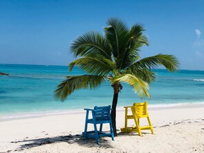 Sun-loungers, beach umbrellas, beach towels