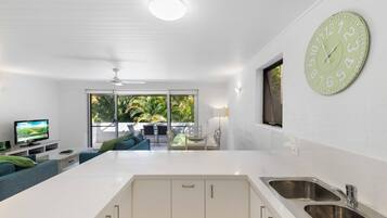 Apartment, 2 Bedrooms, Pool View (Unit 5) | Private kitchen | Full-sized fridge, microwave, oven, stovetop