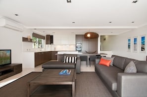 Apartment, 2 Bedrooms (Unit 3) | Living room | LCD TV, DVD player