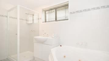 Apartment, 2 Bedrooms, River View | Bathroom | Separate bathtub and shower, jetted bath, free toiletries, hair dryer