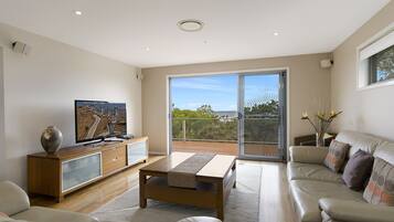 House, 4 Bedrooms | Living room | 50-inch plasma TV with cable channels, TV, DVD player