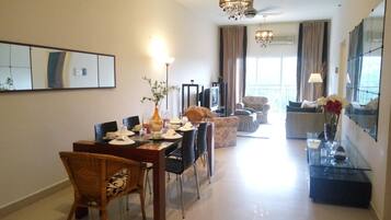 Family Apartment, 3 Bedrooms, Park View, Garden Area | Living area | TV, ping pong