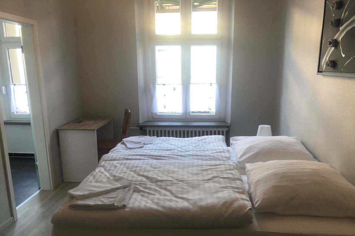 Desk, free WiFi, bed sheets