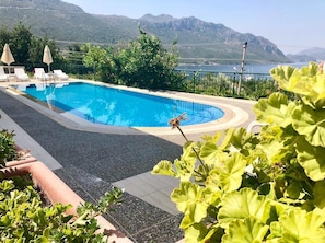 Outdoor pool, pool umbrellas, pool loungers