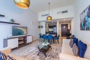 Appartement, 2 chambres | Salle de séjour | Téléviseur ACL