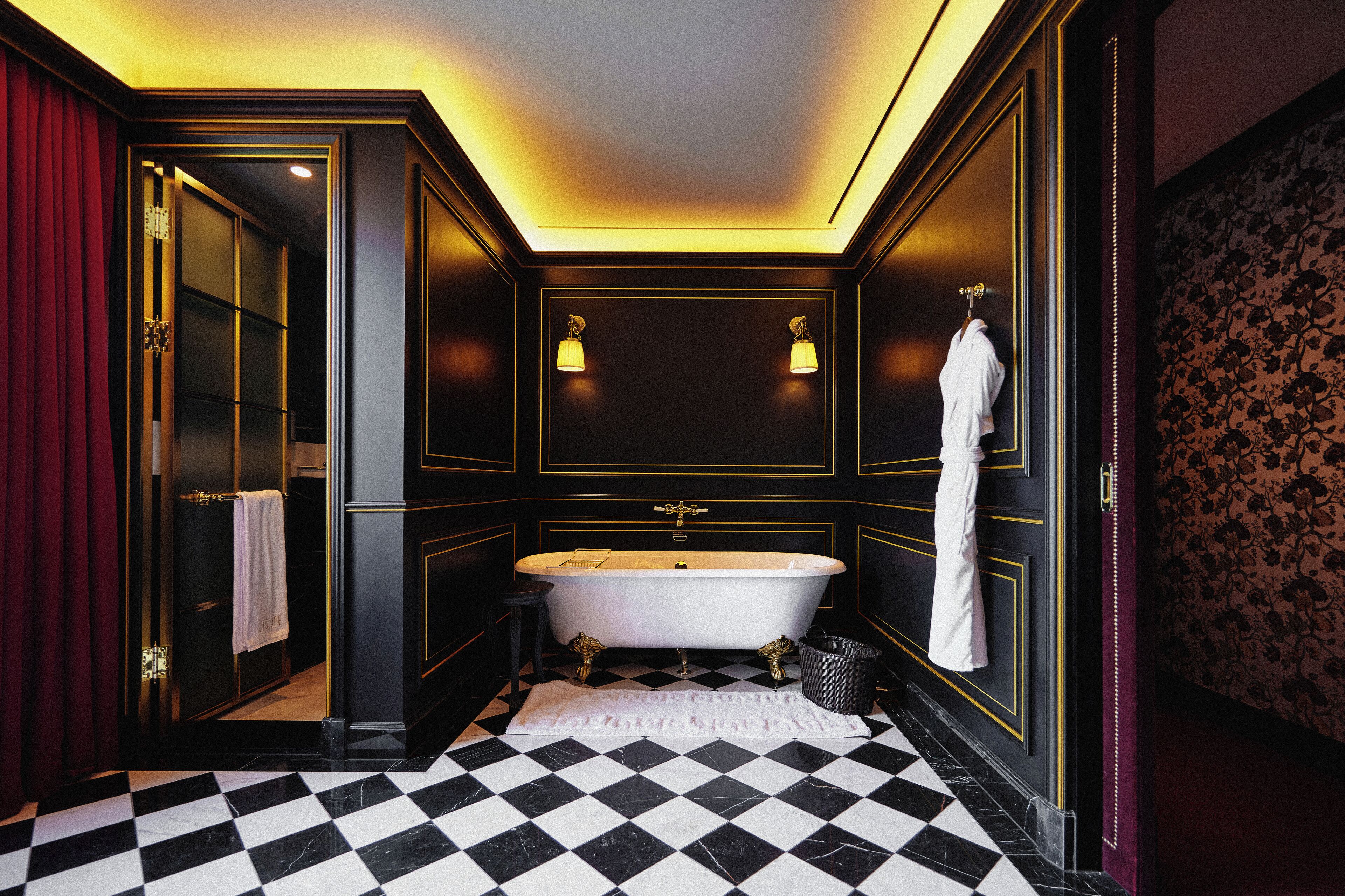 boutique home presidential suite | bathroom | hair dryer, bathrobes, slippers, bidet