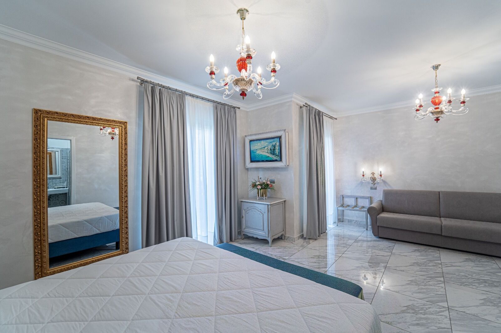 deluxe quadruple room | minibar, in-room safe, desk, blackout curtains