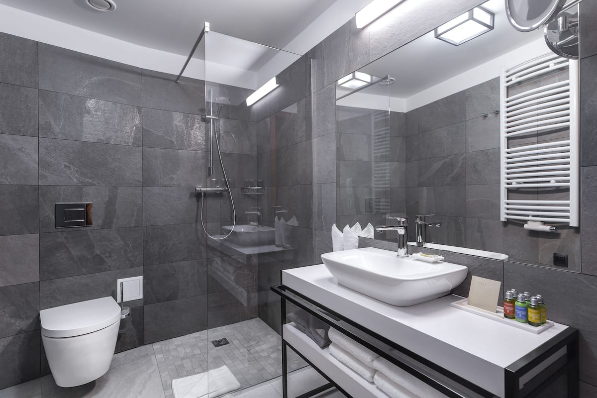 classic double or twin room | bathroom | shower, free toiletries, hair dryer, slippers