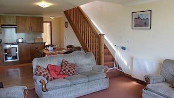Cottage, 3 Bedrooms (1 Double, 1 Twin, and 1 Triple Bunk) | Living area | Flat-screen TV, DVD player