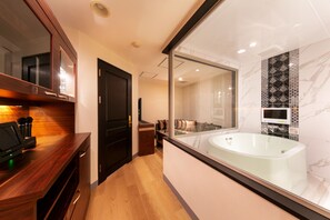 Chambre Double Deluxe | Baignoire à jets