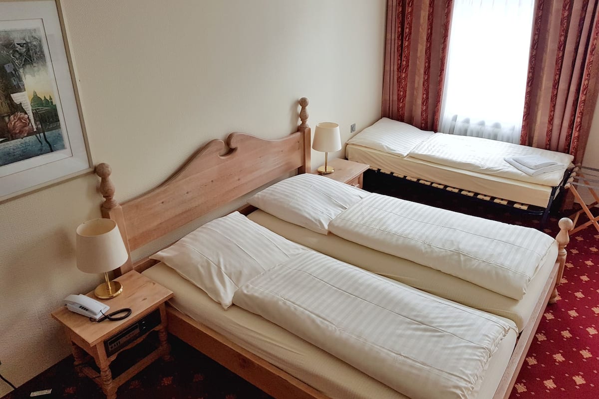 triple room | in-room safe, desk, blackout curtains, soundproofing