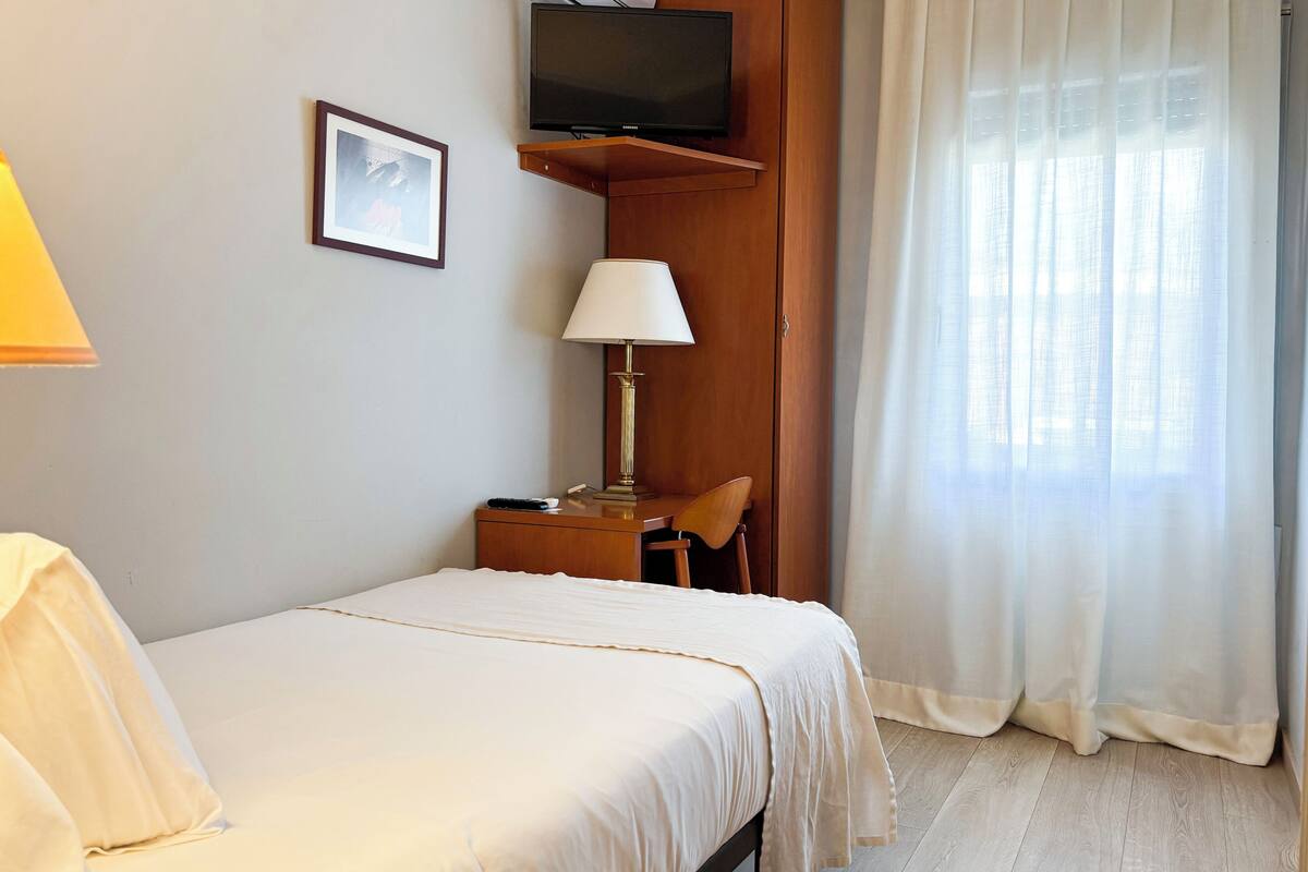 Habitació individual estàndard | Escriptori i espai de treball apte per a portàtils 