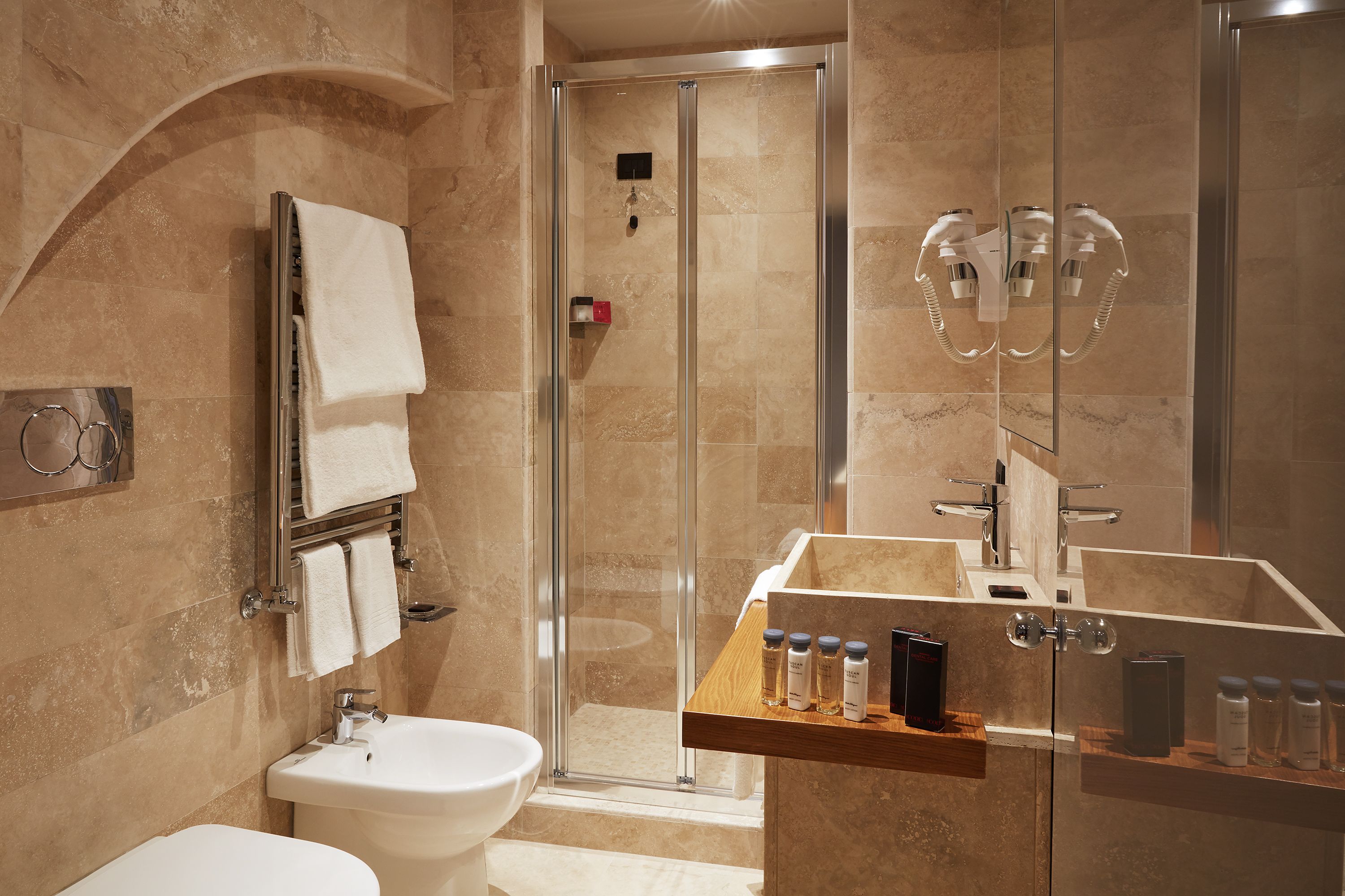 shower, free toiletries, hair dryer, bidet