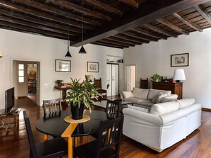 Apartment, 1 Bedroom | Living area | Flat-screen TV
