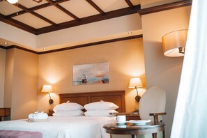 Quarto standard | Frigobar, cortinas blackout, Wi-Fi de cortesia, roupa de cama