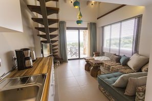 Loft (2 - 4 adults) | Living area | 32-inch LCD TV with satellite channels, TV