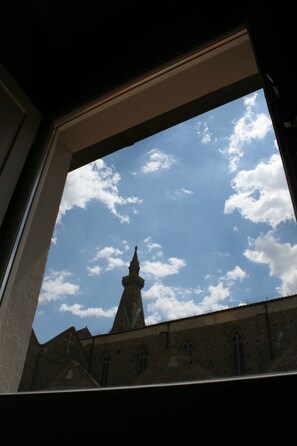 Stunning view of a building with a distinctive tower and arched windows.
