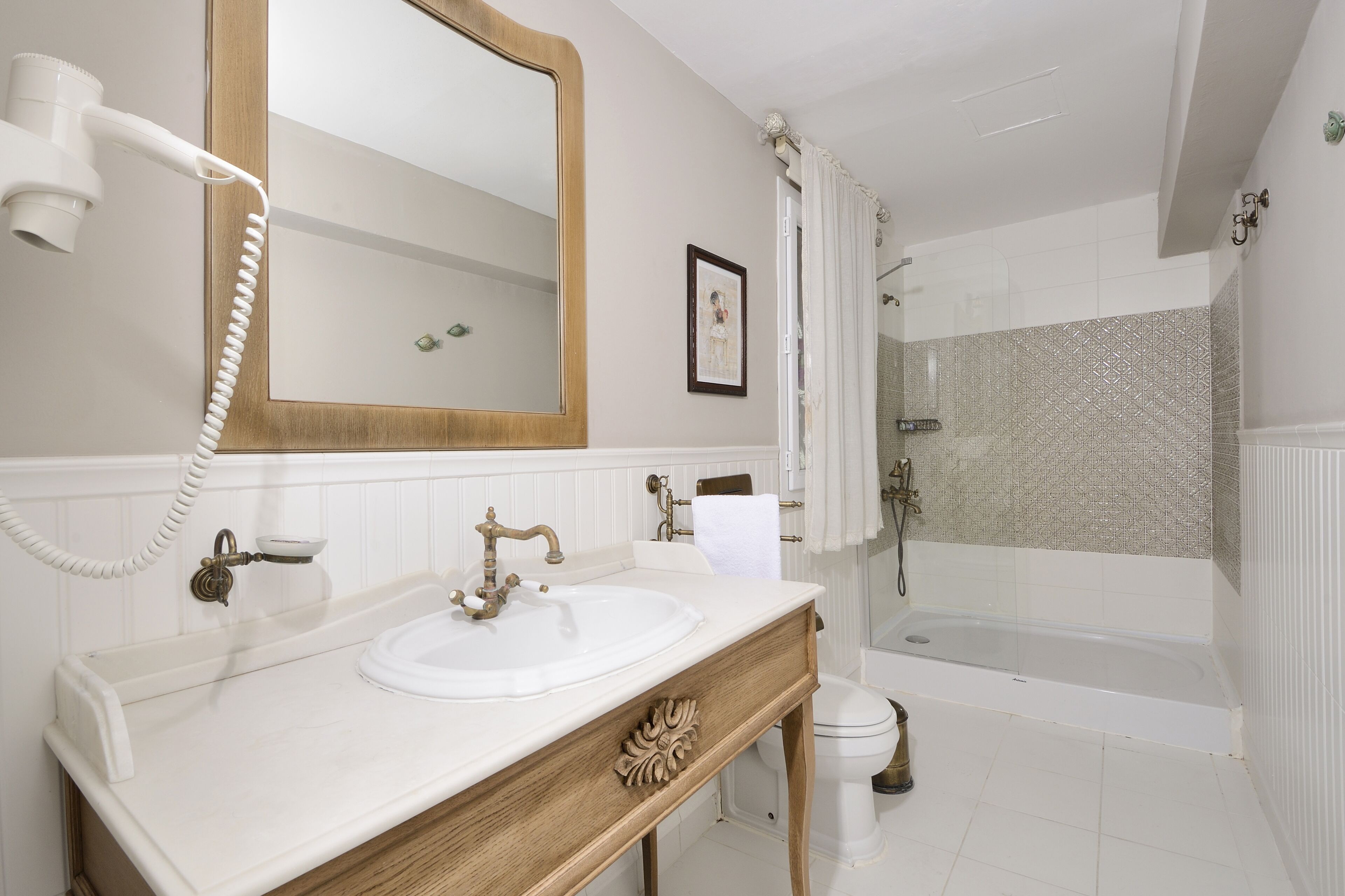 standard room | bathroom | shower, free toiletries, hair dryer, slippers