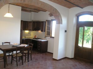 Family Apartment, Hill View | Private kitchen | Fridge, oven, stovetop, coffee/tea maker - Agriturismo Podere Casalone (Capraia e Limite)