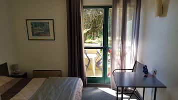 Desk, laptop workspace, rollaway beds, free WiFi