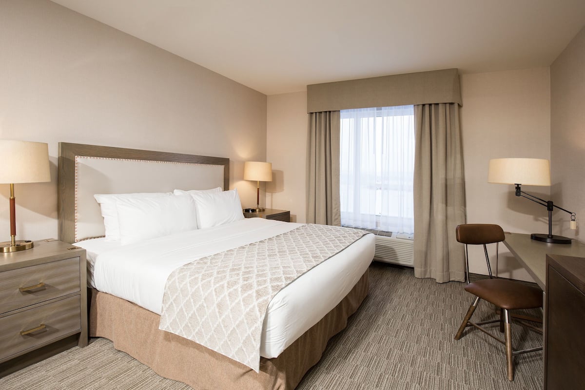 Premium bedding, pillow-top beds, desk, laptop workspace