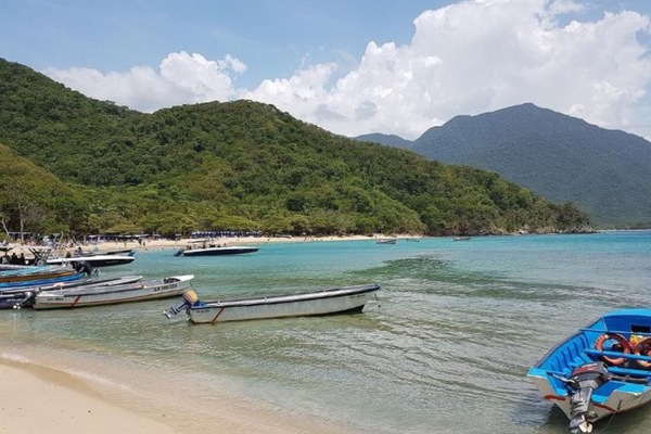 On the beach, sun loungers, beach umbrellas