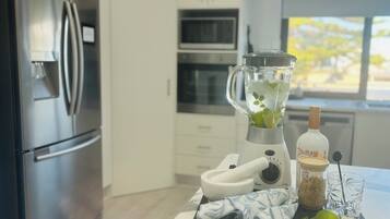 Espresso maker, coffee/tea maker, fridge, microwave