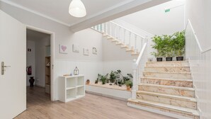 A staircase with white railings and a marble finish, leading to an upper floor. - Lovely Farm with Pool @30min Lisbon and Beaches (Palmela)