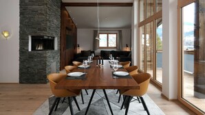 A modern dining area with a wooden table, six chairs, and a stone accent wall.