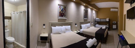 Family Room, Multiple Beds | Desk, soundproofing, free WiFi, bed sheets