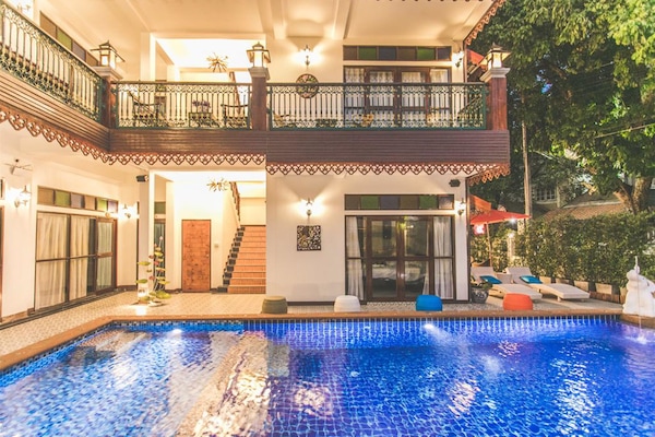 Outdoor pool, open 9:00 AM to 10:00 PM, sun loungers