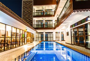 Outdoor pool, open 9:00 AM to 10:00 PM, pool loungers