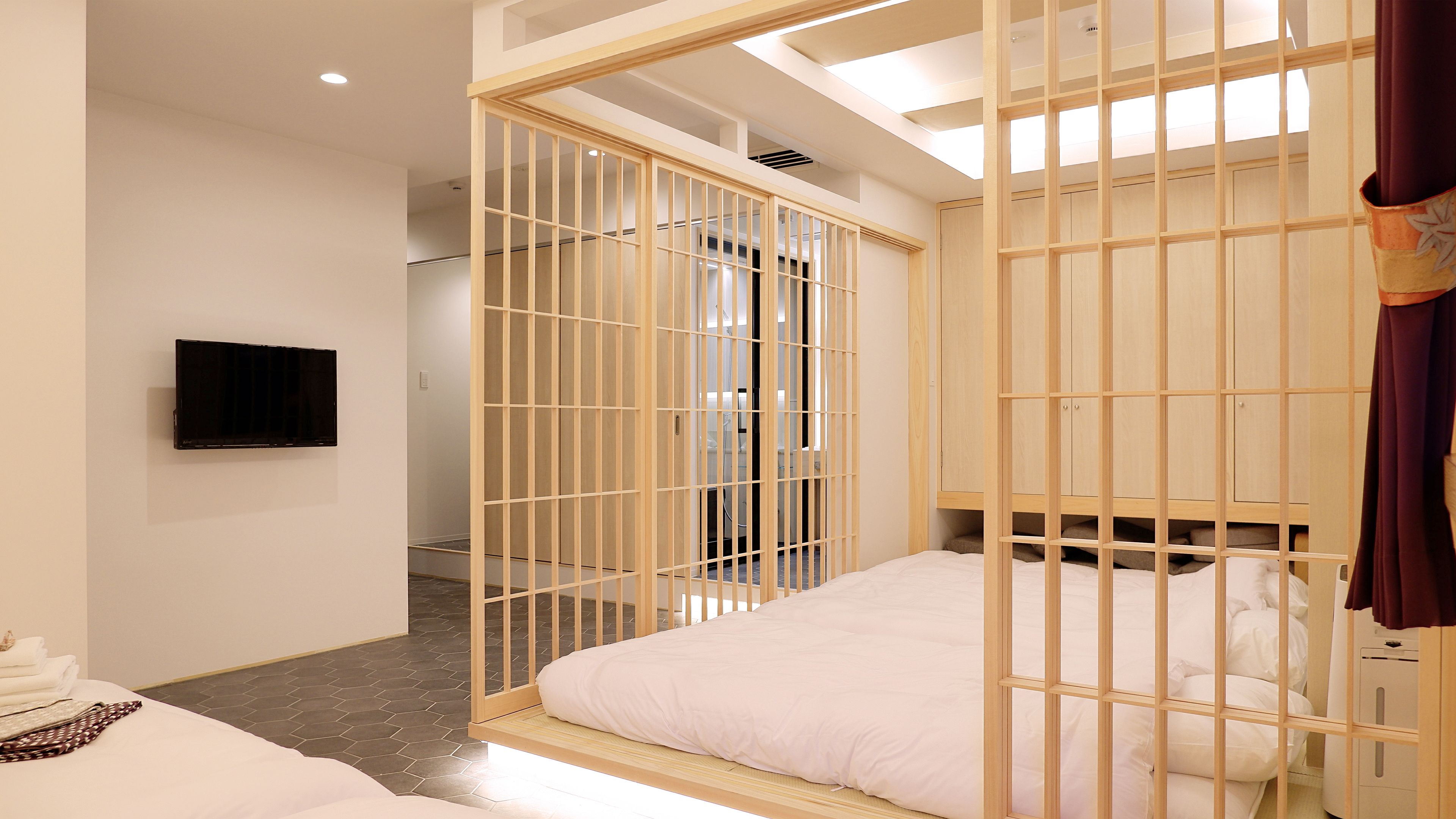 deluxe twin room | in-room safe, individually decorated, blackout curtains