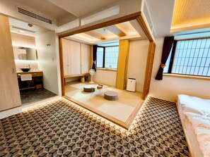 디럭스 트윈룸 | 객실 내 금고, 각각 다른 스타일의 인테리어, 암막 커튼, 다리미/다리미판