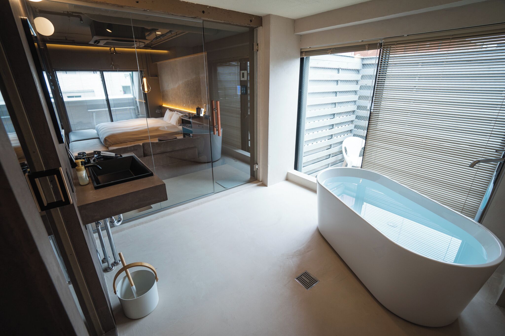 King Suite with Balcony, Non Smoking | Bathroom | Shower, free toiletries, hair dryer, slippers
