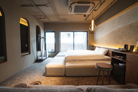 King Suite with Balcony, Non Smoking | 1 bedroom, blackout drapes, free WiFi, bed sheets