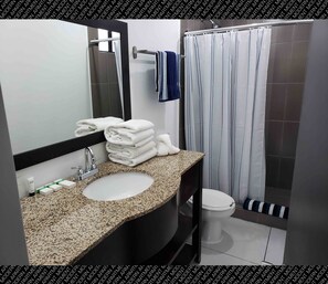 Shower, free toiletries, hair dryer, slippers