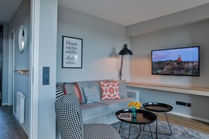 Flat-screen TV - Bett & Bude Boardinghouse (Sylt)